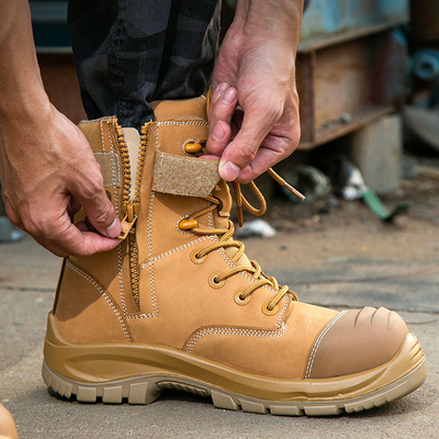 ซื้อ รองเท้าบูททำงานมาร์ตินหนังวัว OEM หนัง PU+ยาง รองเท้า Wok Safety Boots หัวเหล็กไฟเบอร์กลาส พื้นรองเท้าชั้นกลาง Kevlar Safety Shoes online manufacture